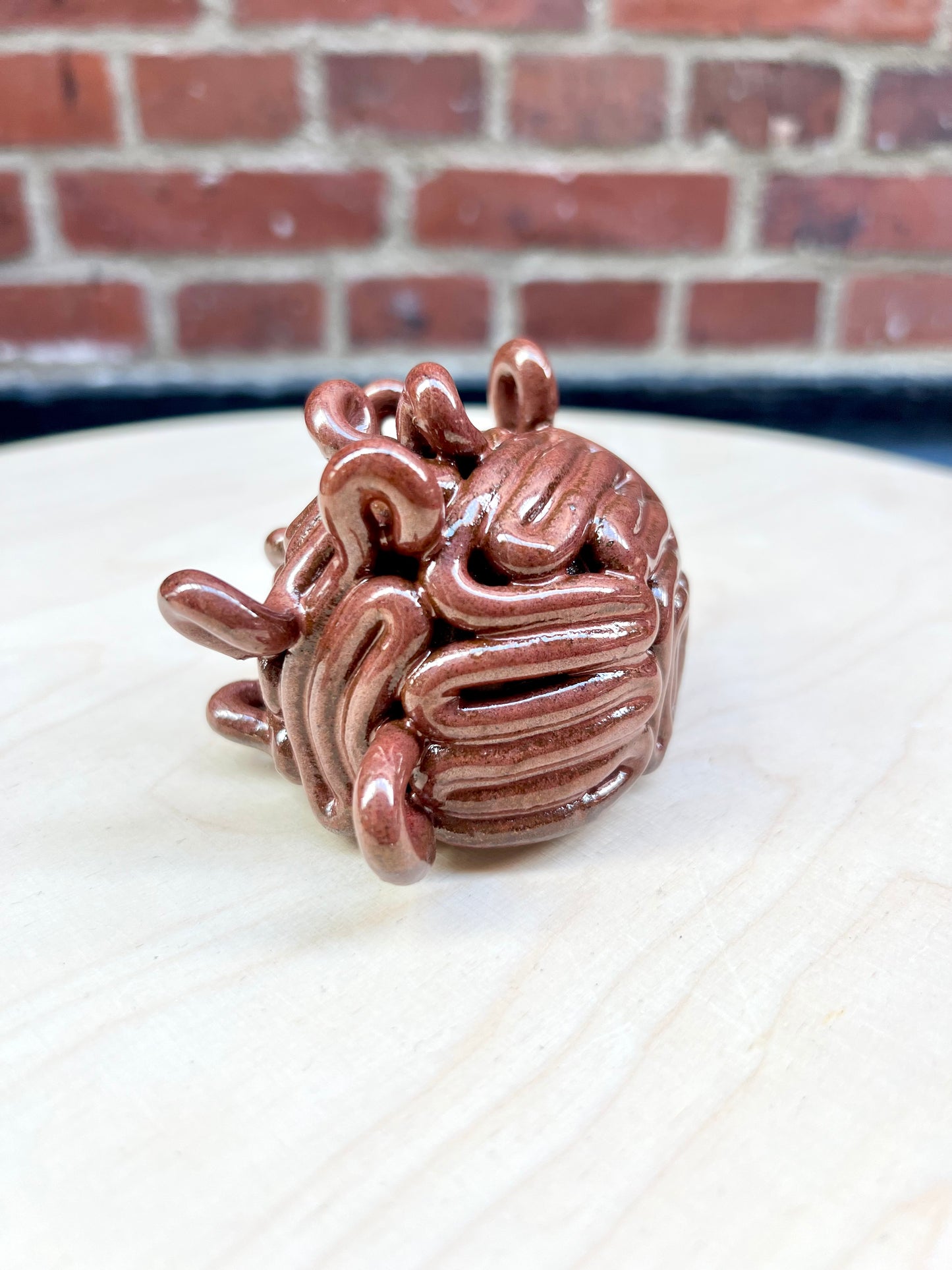 Krøllet hjerne terracotta rød (mini)